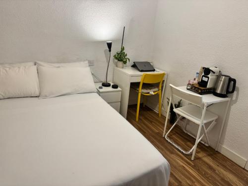 Postel nebo postele na pokoji v ubytování Habitacion sencilla en piso hogareño