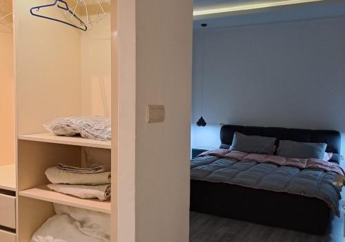 Ένα ή περισσότερα κρεβάτια σε δωμάτιο στο Appartement Atlas Hospitium