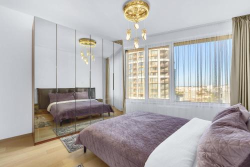 Postel nebo postele na pokoji v ubytování Skypark's Luxury Suite I with Prime View