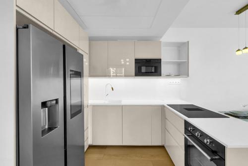 Kuchyň nebo kuchyňský kout v ubytování Skypark's Luxury Suite I with Prime View