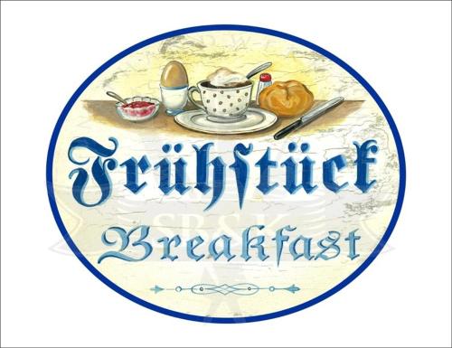 a sign for a breakfast with a cup of coffee at Gemütliche Ferienwohnung Bergzyt - oder Bed and Breakfast , Tradition trifft Gemütlichkeit - Ski und Wandergebiet in Linthal
