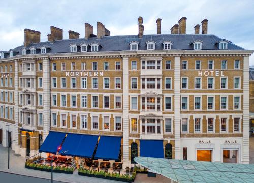 a large building in front of a hotel at Kaya Great Northern Hotel, London in London