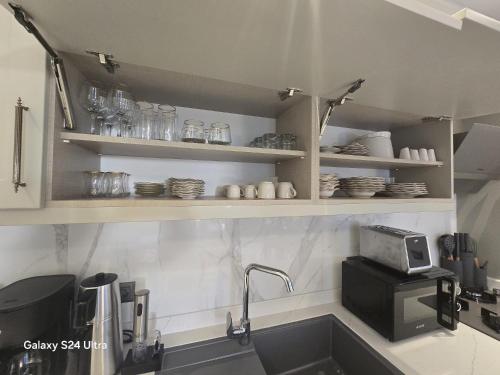 Η κουζίνα ή μικρή κουζίνα στο Luxuriöse Ferienwohnung in Manavgat ilica