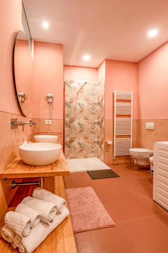 a bathroom with a sink and a shower at CameliaLoft in San Marino