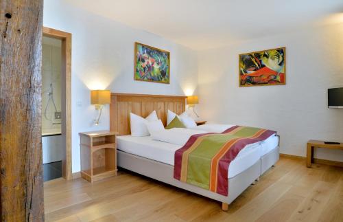 Postel nebo postele na pokoji v ubytování Hotel Haus Lipmann