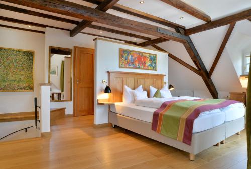 Postel nebo postele na pokoji v ubytování Hotel Haus Lipmann