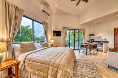 Ένα ή περισσότερα κρεβάτια σε δωμάτιο στο Blue Jungle Lodge