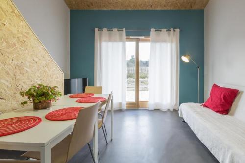 Ένα ή περισσότερα κρεβάτια σε δωμάτιο στο GITES DE LA GARE