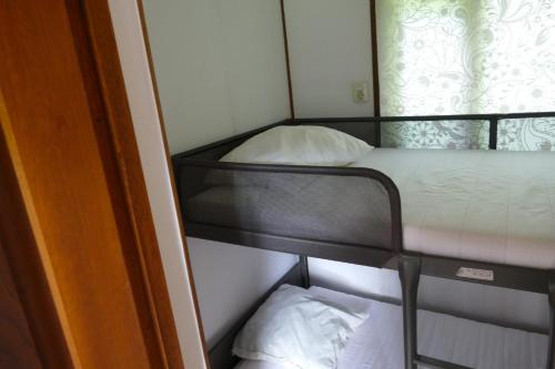 Postel nebo postele na pokoji v ubytování Houten accommodatie Sasseltermillen Woltzdal