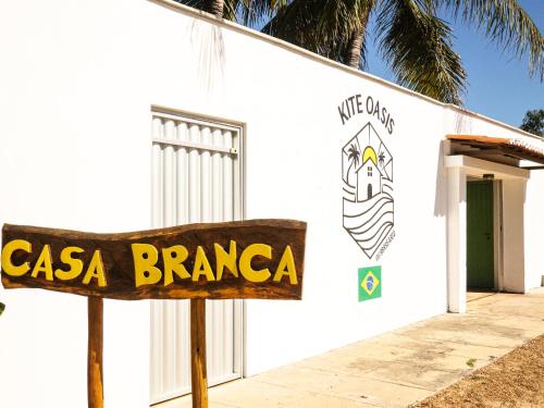 a sign that reads casa branca in front of a building at Kite Oasis Parajuru Casa Branca in Parajuru