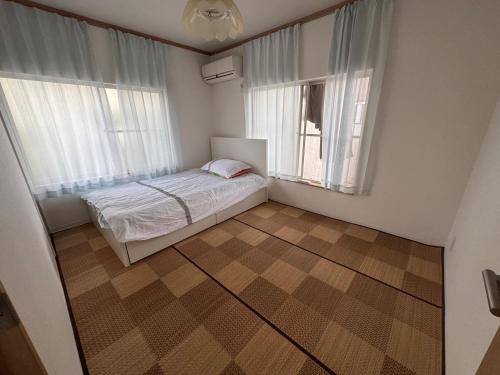 Un ou plusieurs lits dans un hébergement de l'établissement Karwan House