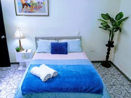 Ένα ή περισσότερα κρεβάτια σε δωμάτιο στο Miraflores Private Rooms