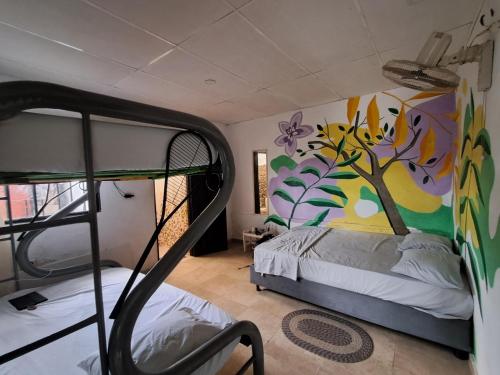 Ένα ή περισσότερα κρεβάτια σε δωμάτιο στο CASA BLANCA Hostal