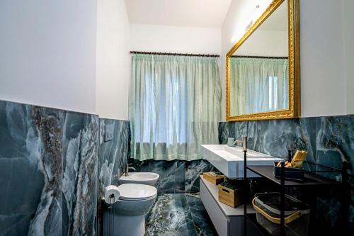 Ένα μπάνιο στο Podere Fonte Luxury Country House