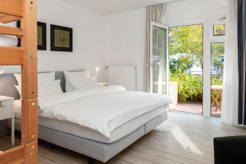 Postel nebo postele na pokoji v ubytování Appartementhaus Bracht - Kätemöh