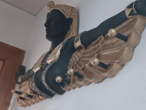 a statue of a woman is hanging from a ceiling at Comic Fantasy & Cosplay - Leipzig-Halle - Messe, 4 Betten, Parkplätze, echte Kamine in Delitzsch