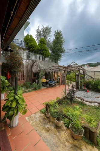 Galería fotográfica de Ri's Garden Homestay - Nhà gỗ bên sườn đồi en Ấp Ða Thiên