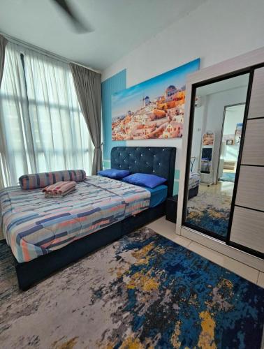 a bedroom with a bed and a large mirror at Premium Suite Vista Alam Seksyen 14 Shah Alam in Shah Alam