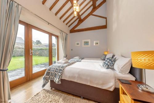 Postel nebo postele na pokoji v ubytování Trehafod