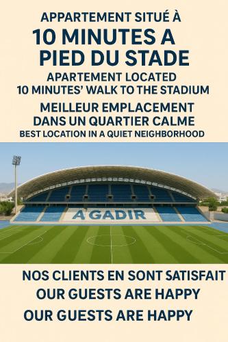 a poster for a soccer game at a stadium at Flat Al farabi in Agadir