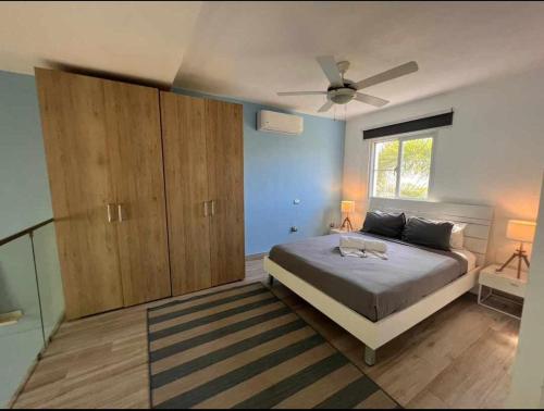 Una cama o camas en una habitación de Boca Paraíso 113