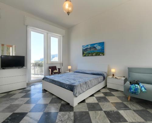 Ένα ή περισσότερα κρεβάτια σε δωμάτιο στο Villa Rosa Mondello