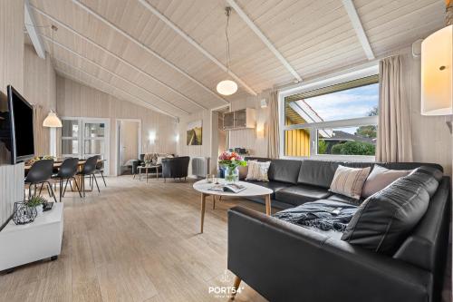 Χώρος καθιστικού στο Ferienhaus Poolhaus Schönhagen