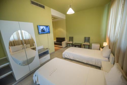 Ένα δωμάτιο στο Luani A Hotel