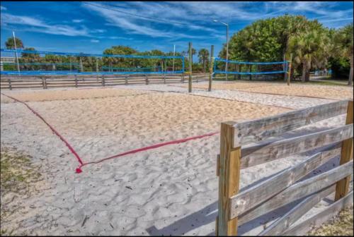 a volley ball hoop on a sandy field at Paradise Beach West in Indialantic