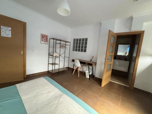 Ένα ή περισσότερα κρεβάτια σε δωμάτιο στο Origen Bed and Breakfast