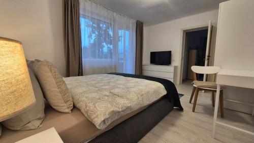 Ένα ή περισσότερα κρεβάτια σε δωμάτιο στο Alecsandri Residence 2