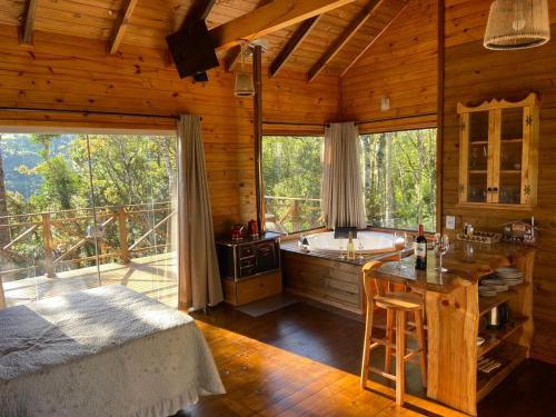 Foto sihtkohas Urubici asuva majutusasutuse Cabanas Sol e Lua com jacuzzi e vista para as montanhas em Urubici galeriist