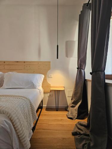 Ένα ή περισσότερα κρεβάτια σε δωμάτιο στο Dolcevita guest house