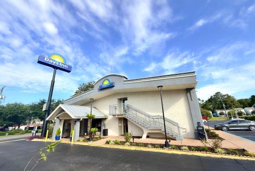 a building with a sign in front of it at Days Inn by Wyndham Tallahassee University Center in Tallahassee
