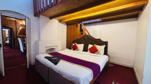 a bedroom with a large bed in a room at Hidden valley in Ooty