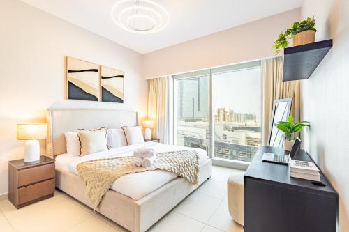 Postel nebo postele na pokoji v ubytování Great 1 BDR in the Iconic Gate Tower - 5 min to ADGM, Cleveland, Galleria or Beach - High Floor - Heart of Al Reem Island