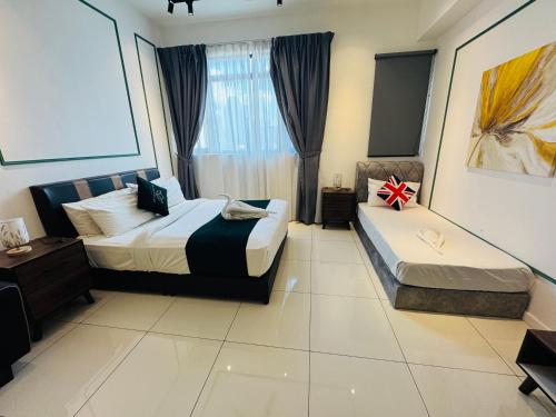 Katil atau katil-katil dalam bilik di Chamber Suite KLCC