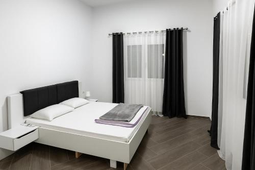 Postel nebo postele na pokoji v ubytování Villa Redzic Residence