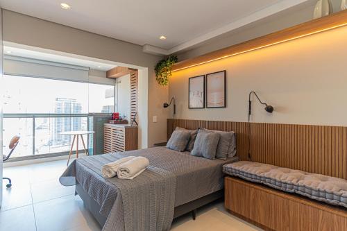 Katil atau katil-katil dalam bilik di Sunset Rooftop Studio - Brooklin Deslumbrante
