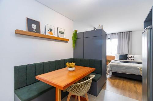 En eller flere senge i et værelse på Studio com 2 camas de casal e garagem - EIX0805