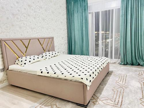 Postel nebo postele na pokoji v ubytování 2-комнатная квартира Жана кала