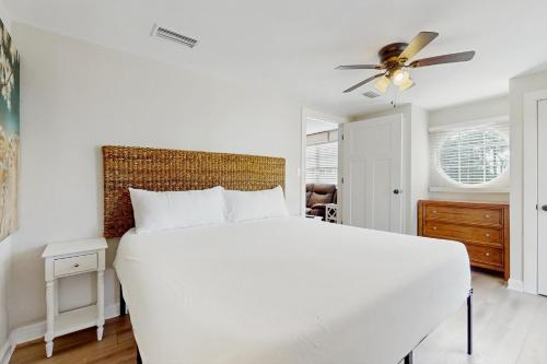 En eller flere senge i et værelse på The Sunset Dreamers