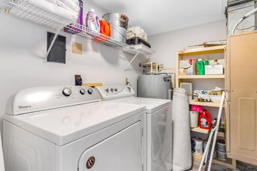 a laundry room with a washer and dryer at Pelican Beach 204 in Ocean City