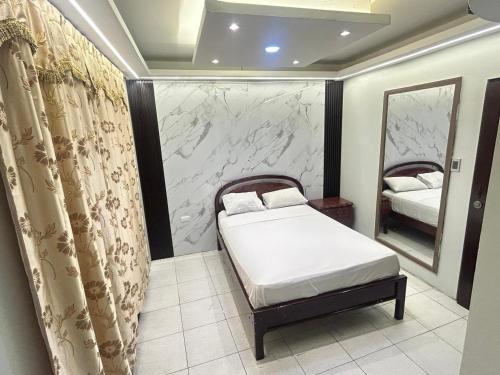 Ένα ή περισσότερα κρεβάτια σε δωμάτιο στο Hotel tower one