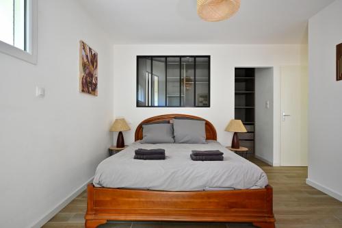 Postel nebo postele na pokoji v ubytování Maison moderne avec jardin sans vis-à-vis, idéal professionnels et familles