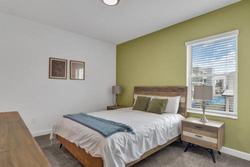 a bedroom with a bed and a window at 475 Strand Dr in Melbourne Beach