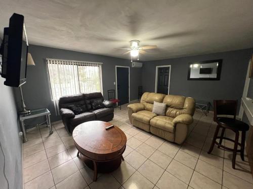 a living room with a couch and a table at Tijuana Stay 1832 in Tijuana