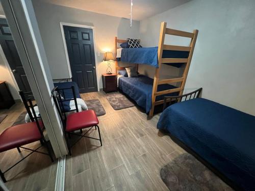 a bedroom with a bed and a bunk bed at Tijuana Stay 1832 in Tijuana