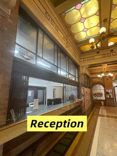 a rendering of a building with the words reception at Georgie Accommodation in Auckland