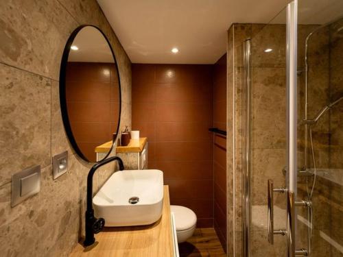 Phòng tắm tại Appartement cosy avec cuisine équipée - API-1-52-760